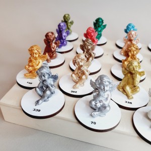 Angelitos de resina blanca