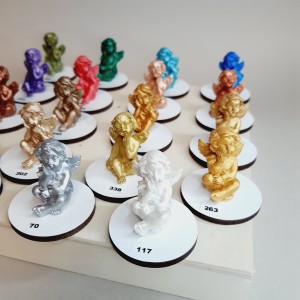 Angelitos de resina blanca