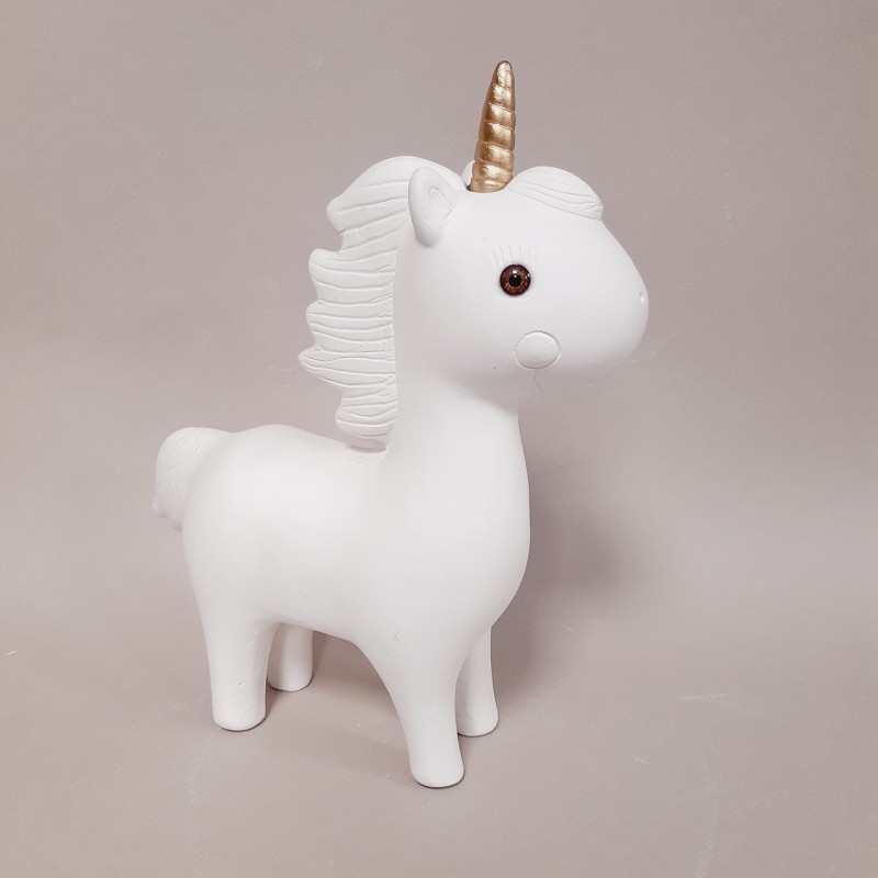 Figura infantil de escayola unicornio vista lateral