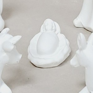 Detalle Niño Jesús y las caritas del Buey y Mula