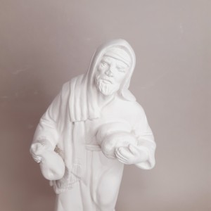 Pastor con panes para portal de Belén