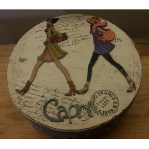 Caja redonda decorada con siluetas como ejemplo